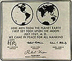 Sign left on the moon has a picture of the Earth's eastern and western hemispheres